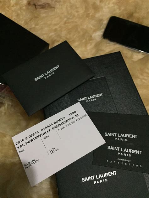 how to check authentic ysl bag|ysl authenticity check code.